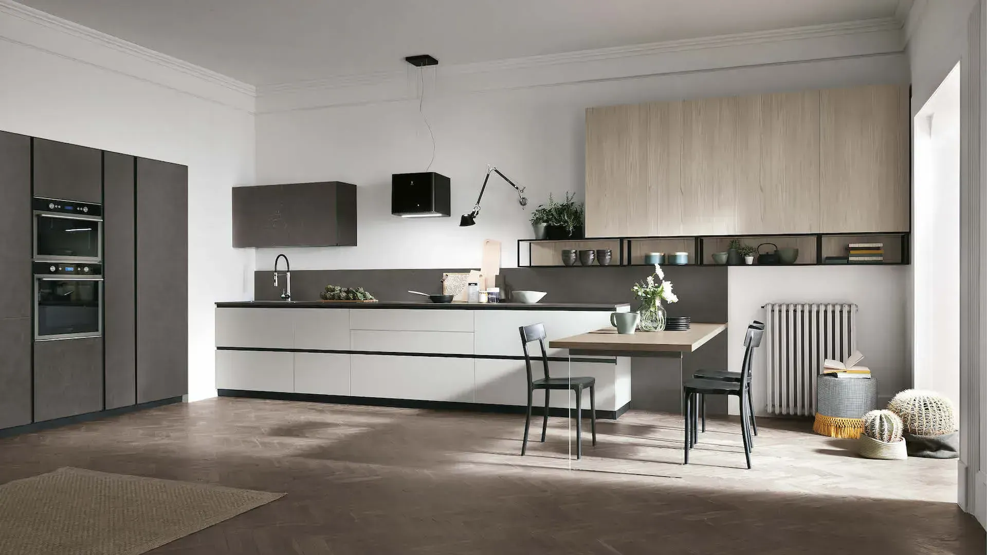 Matt Nebbia Pet base units, Dark Cement wall units and columns. Size wall units and open compartments in Sand Larch. Dark Cement laminate countertop.